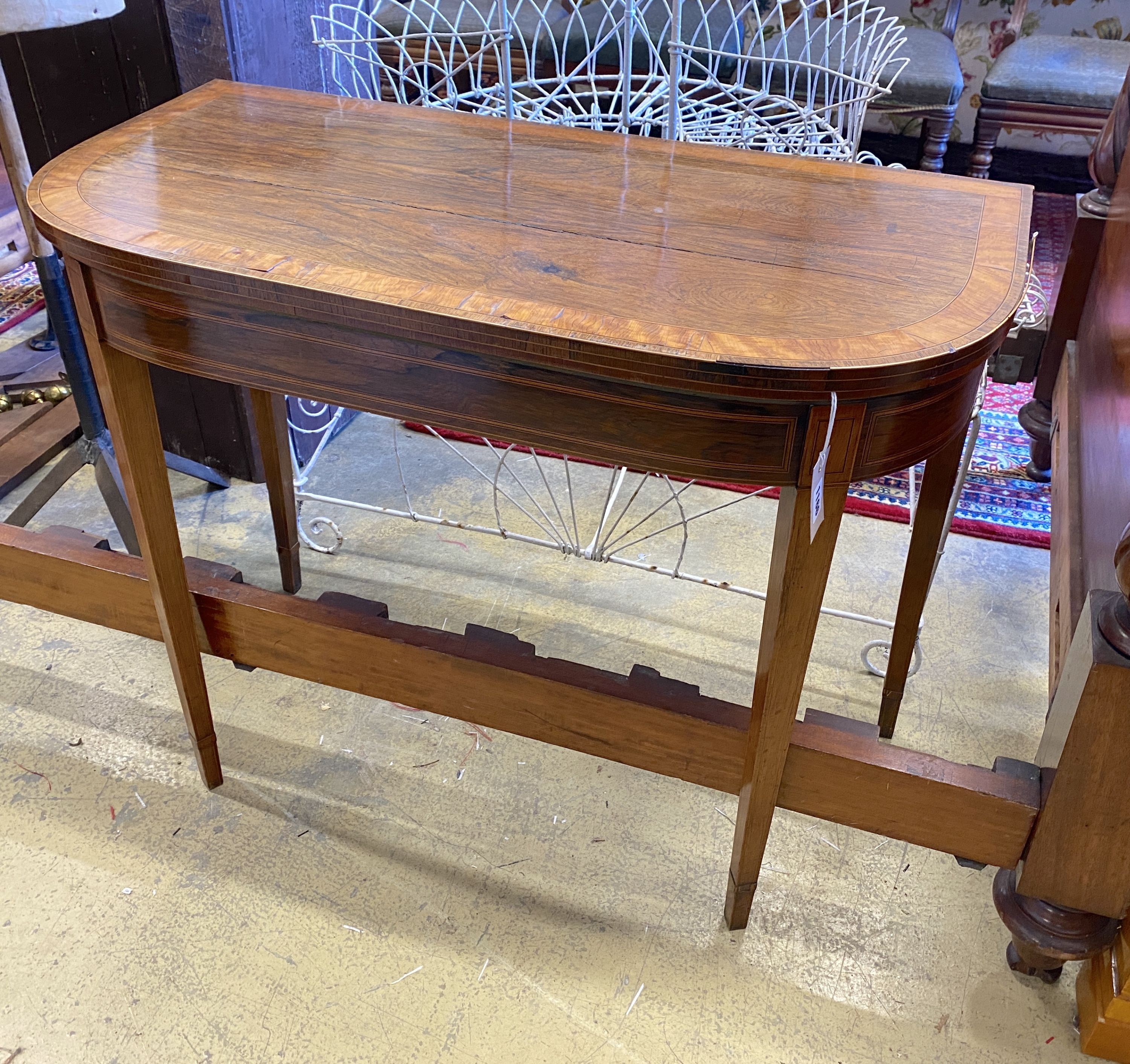 A George III satinwood banded rosewood rectangular folding card table, width 92cm, depth 45cm, height 74cm
